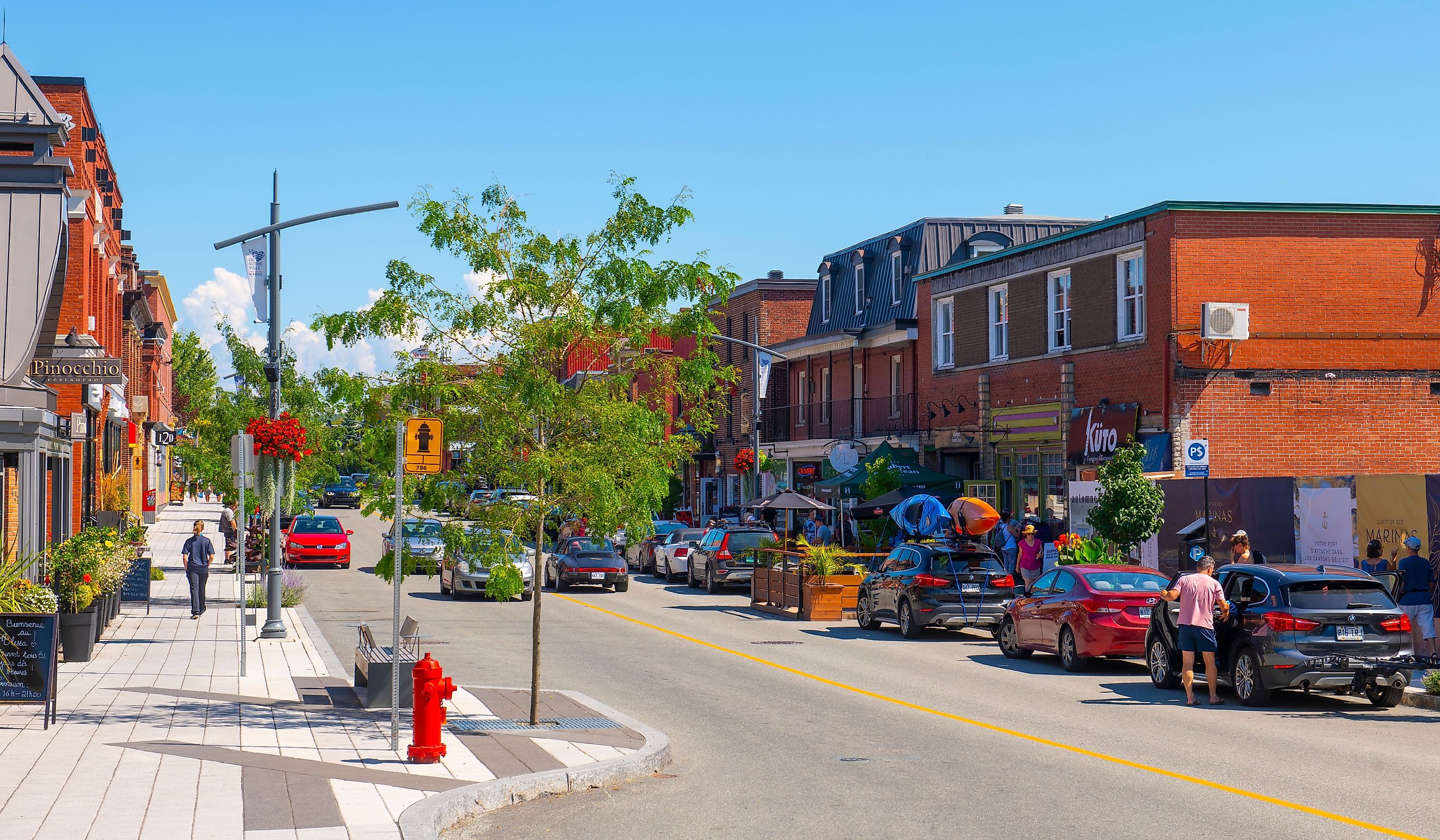 Historic commercial buildings on Rue Principale O Street in downtown Magog, Quebec QC, Canada. Editorial credit: Wangkun Jia / Shutterstock.com