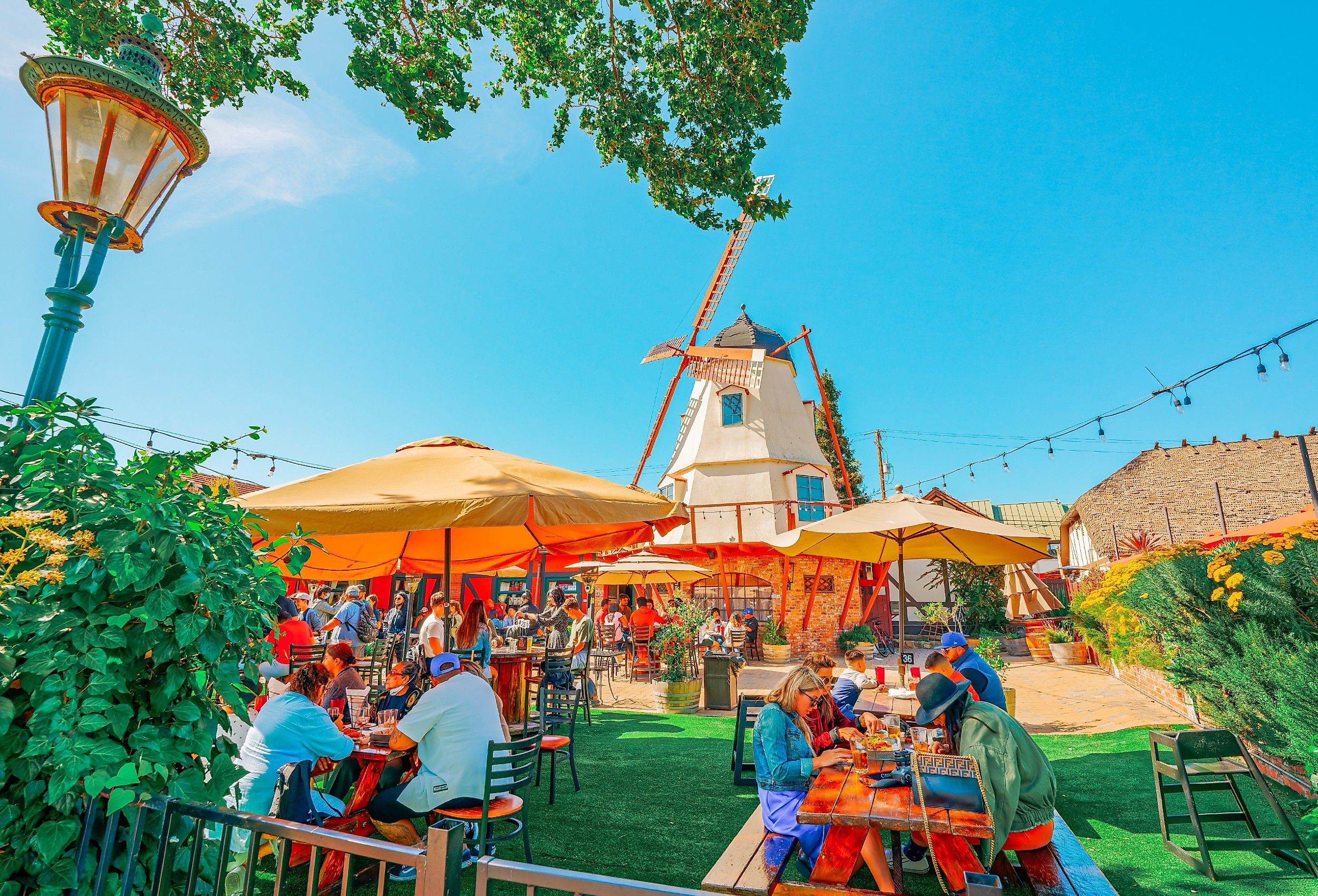 People sit outside at the Solvang Brewing Company, Solvang, California. Image credit HannaTor via Shutterstock