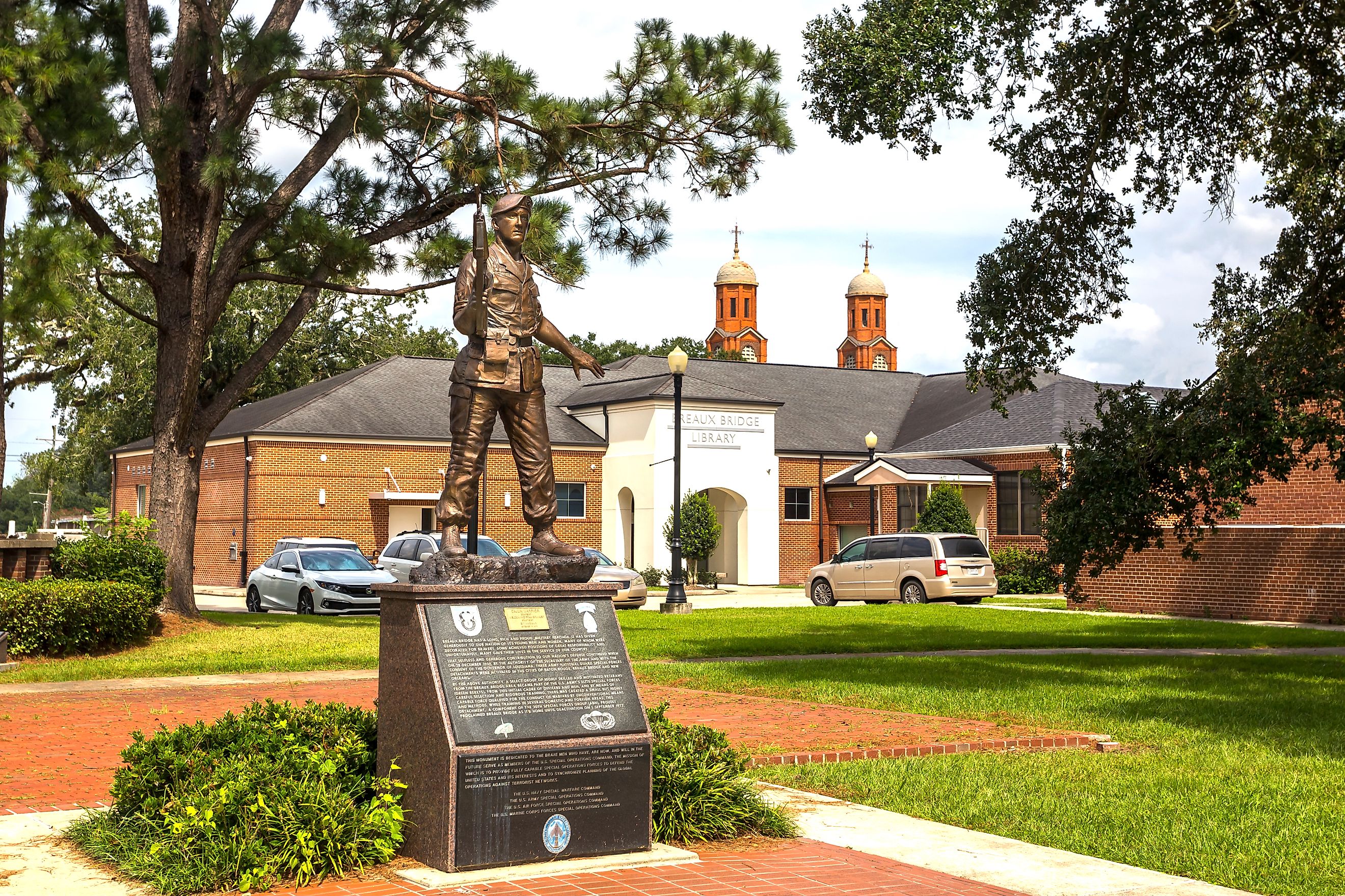 Statue near public library building in Breaux Bridge, Louisiana. Editorial credit: Victoria Ditkovsky / Shutterstock.com.