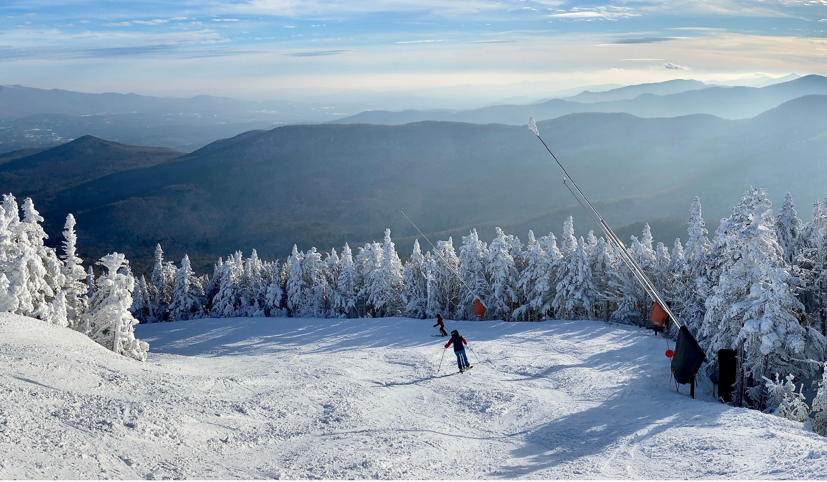 Panoramic mountain view of beautiful mountain peaks at snow day on the top of Stowe Mountain Ski Resort, Vermont.