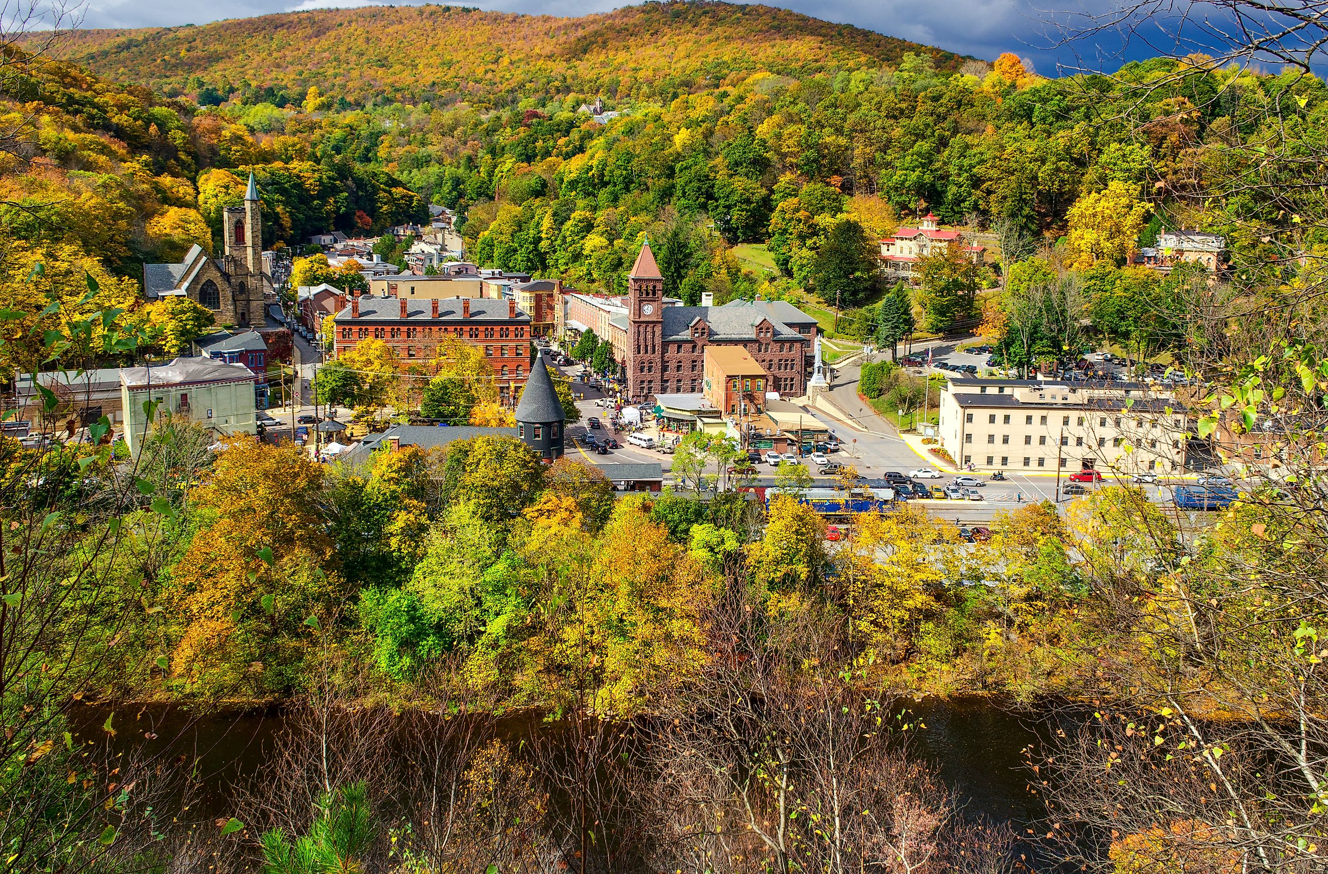 Aerial view of Jim Thorpe, Pennsylvania and surrounding Poconos Mountains during autumn.