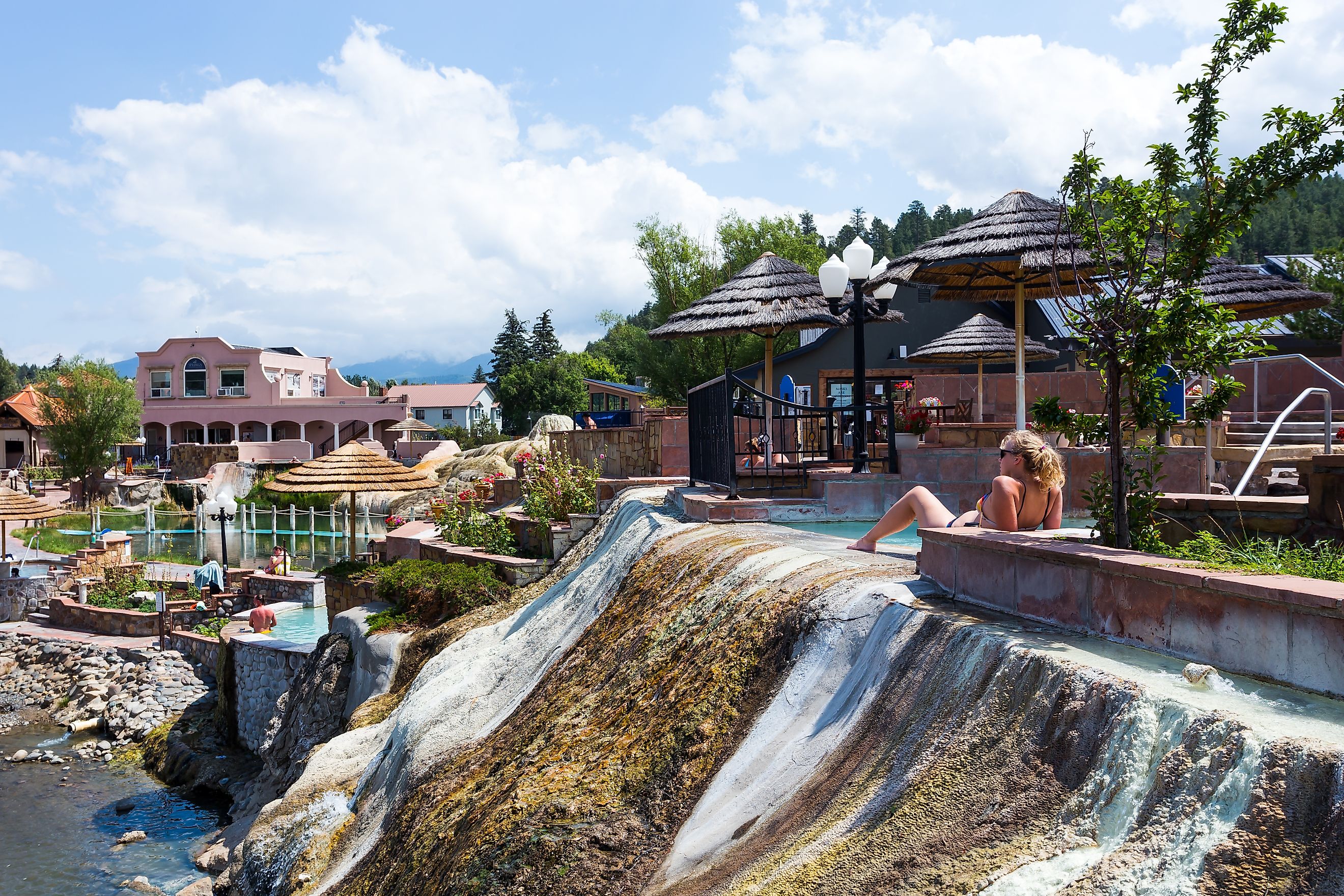 Pagosa Springs, Colorado, USA: People relaxing in popular resort The Springs. Image Credit Victoria Ditkovsky via Shutterstock.