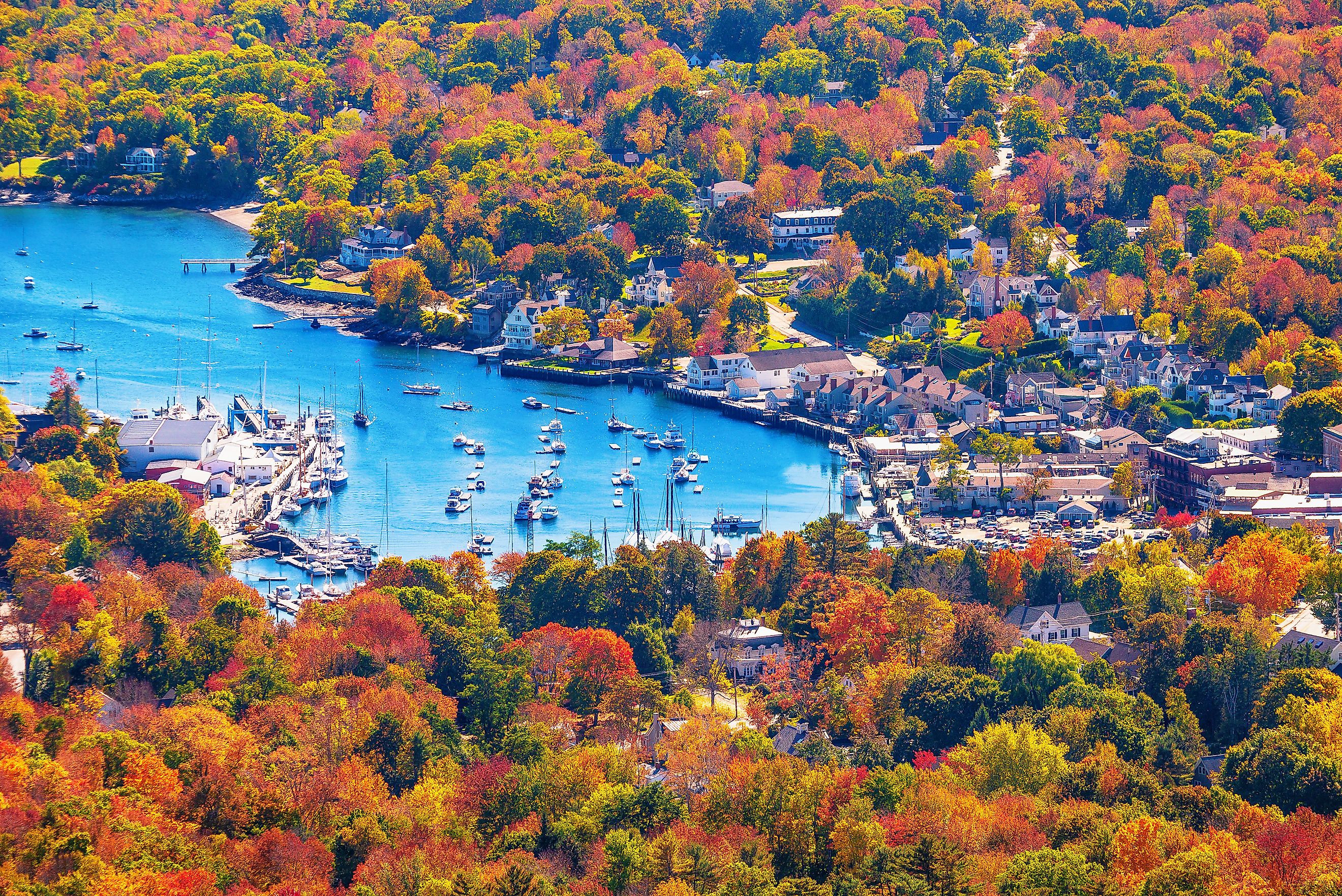 View from Mount Battie overlooking Camden Harbor, Maine with autumn colors.