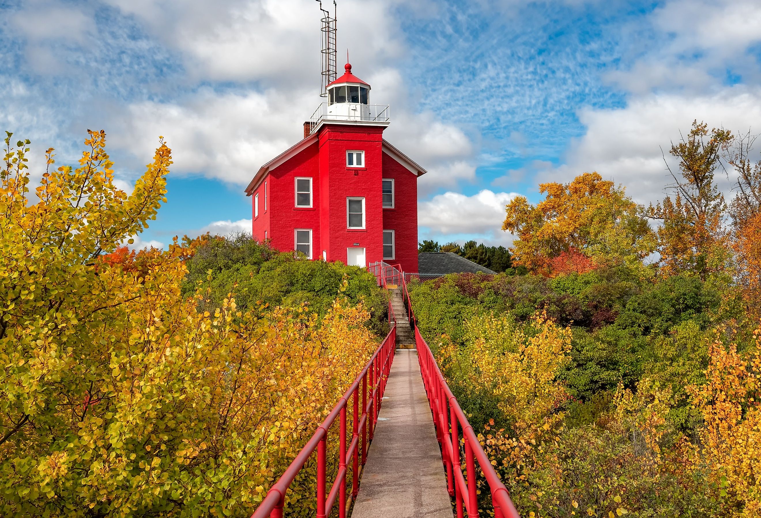 Marquette Harbor Lighthouse on a sunny autumn day in Michigan.