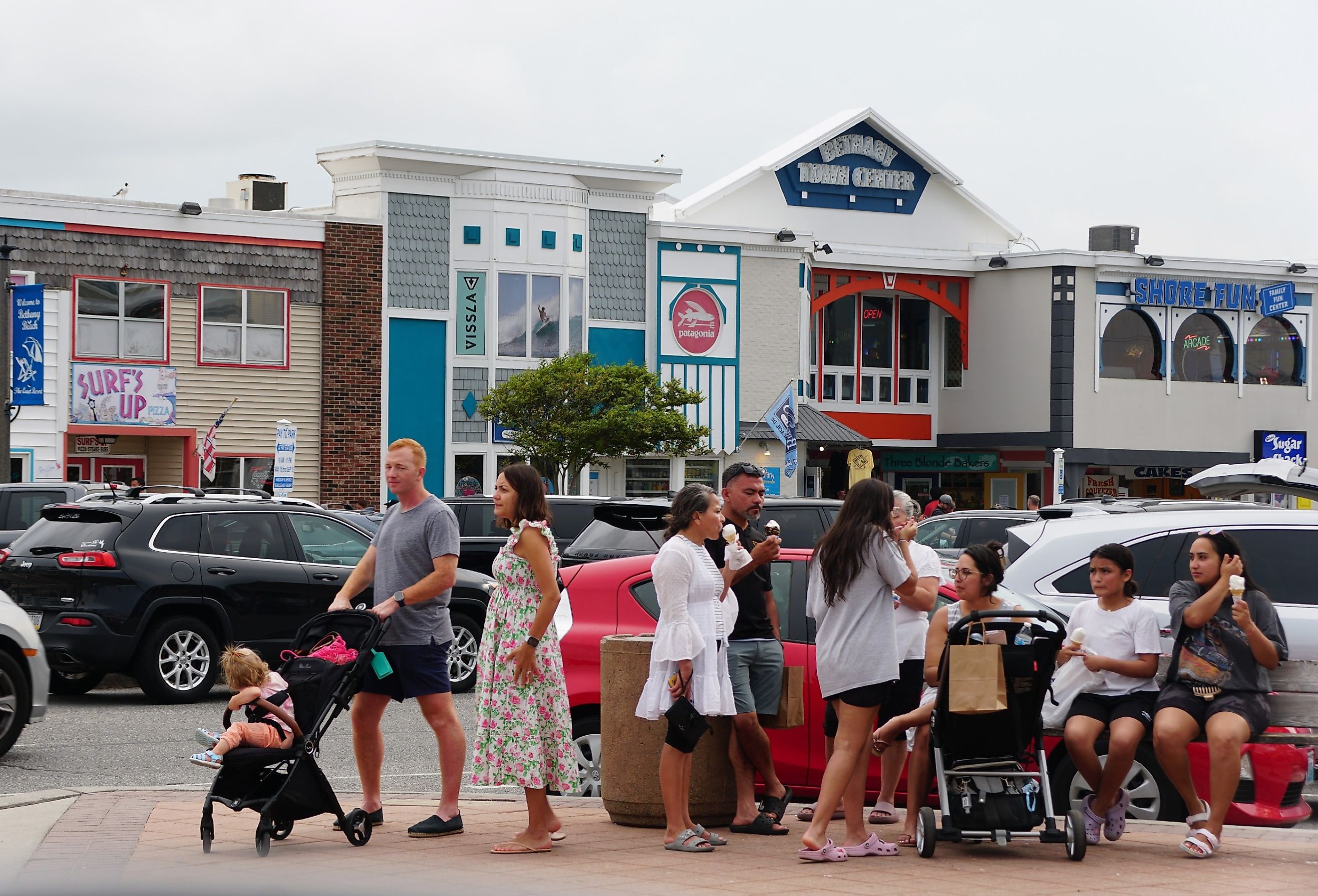 Visitors enjoying the warm summer day on the street in Bethany Beach, Delaware. Image credit Khairil Azhar Junos via Shutterstock