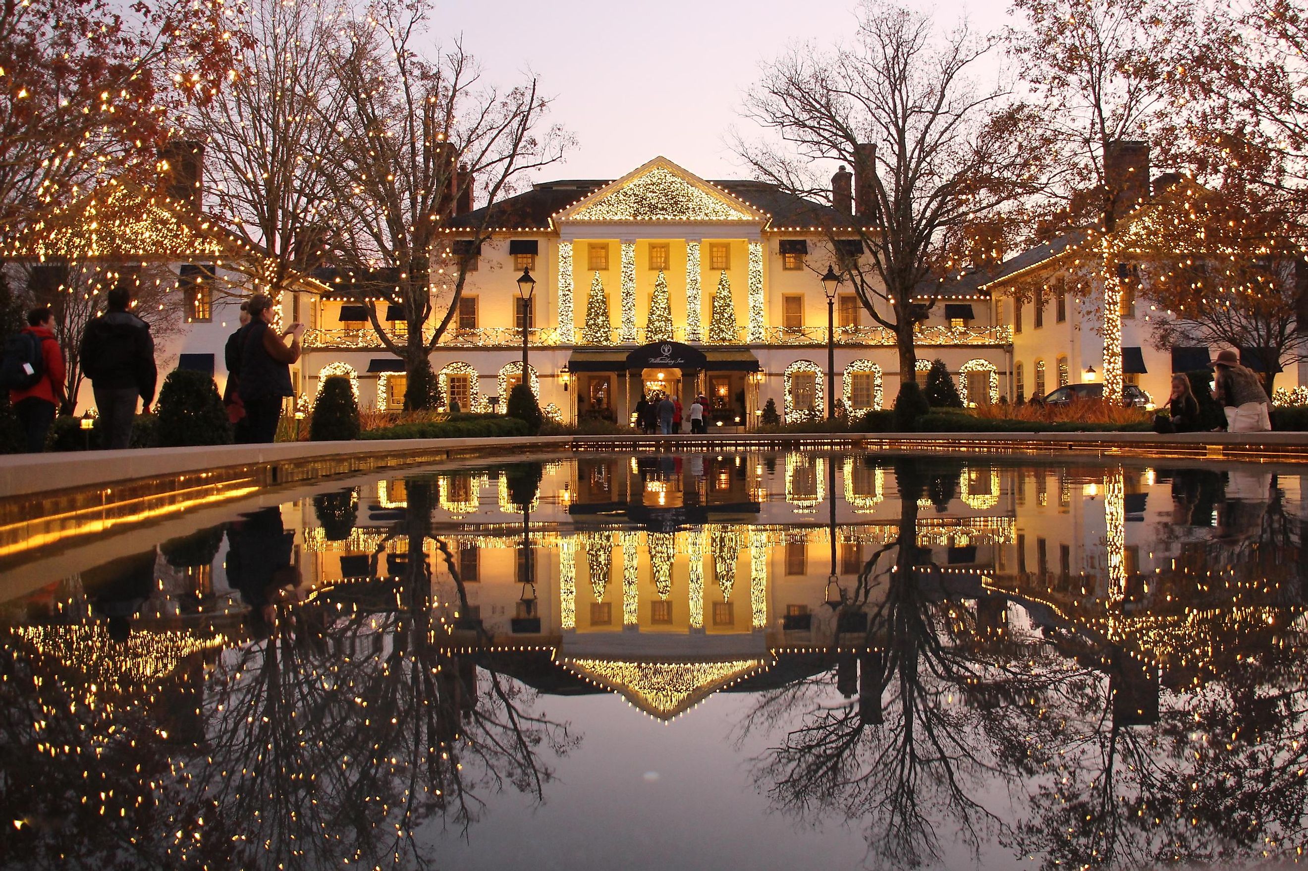 Williamsburg, Virginia: Holiday decorations at the Williamsburg Inn reflected in an outdoor fountain. Editorial credit: Christopher W Becke / Shutterstock.com