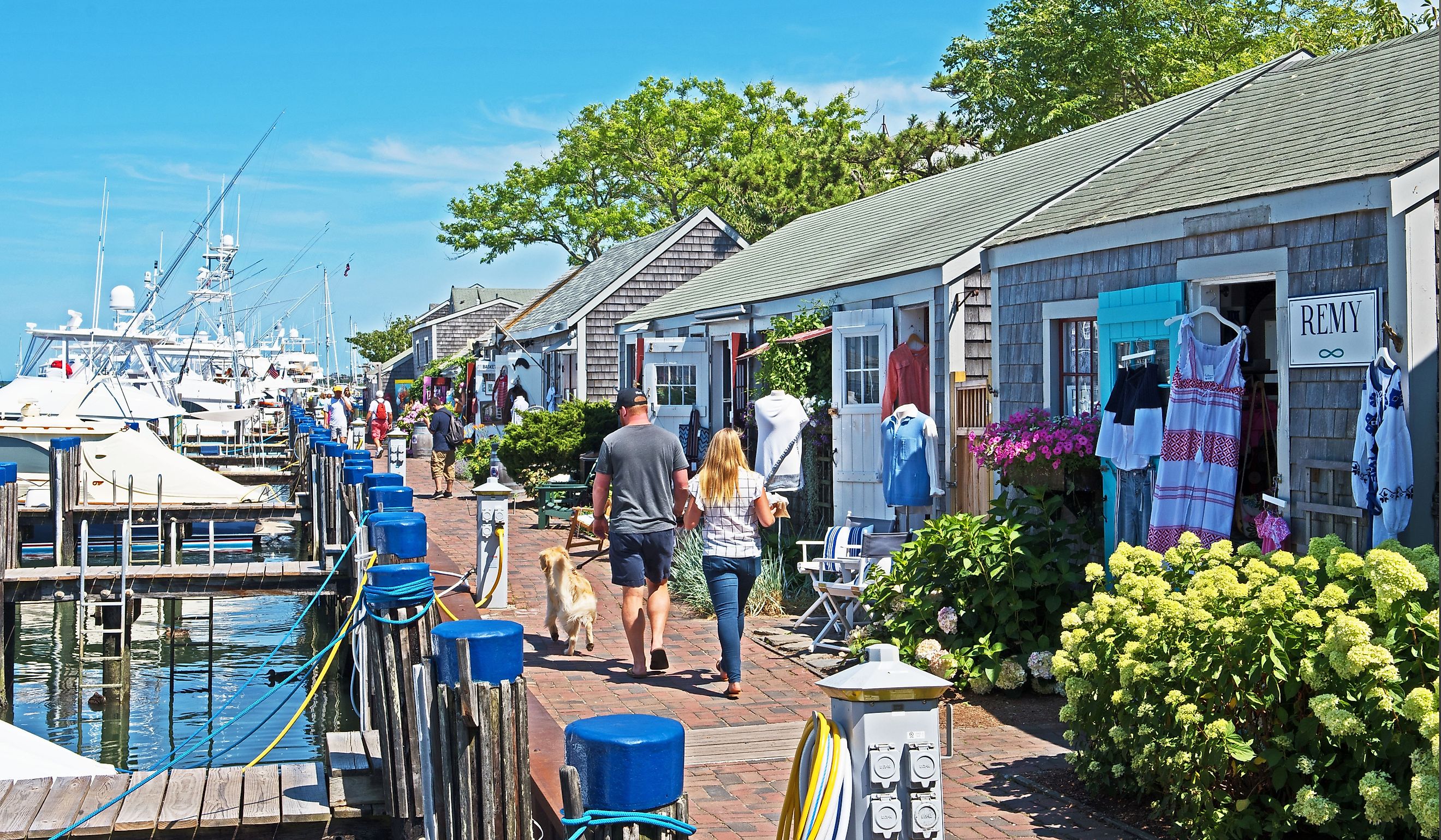 A row of eclectic stores can be found next to the harbor in Nantucket. Editorial credit: Mystic Stock Photography / Shutterstock.com