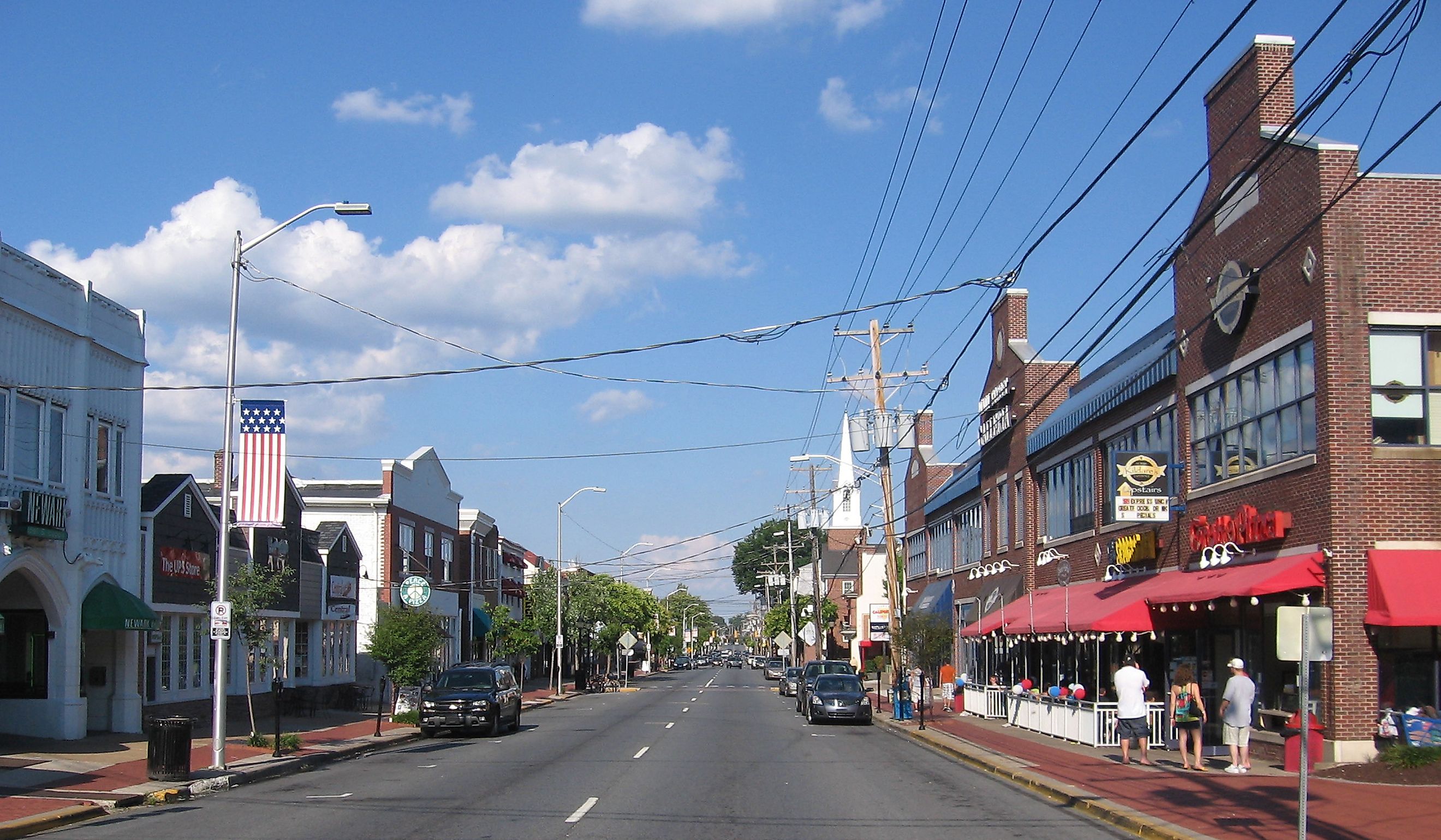 Buildings along Main Street in Newark, Delaware. By PookieFugglestein - Own work, CC0, Wikimedia Commons.