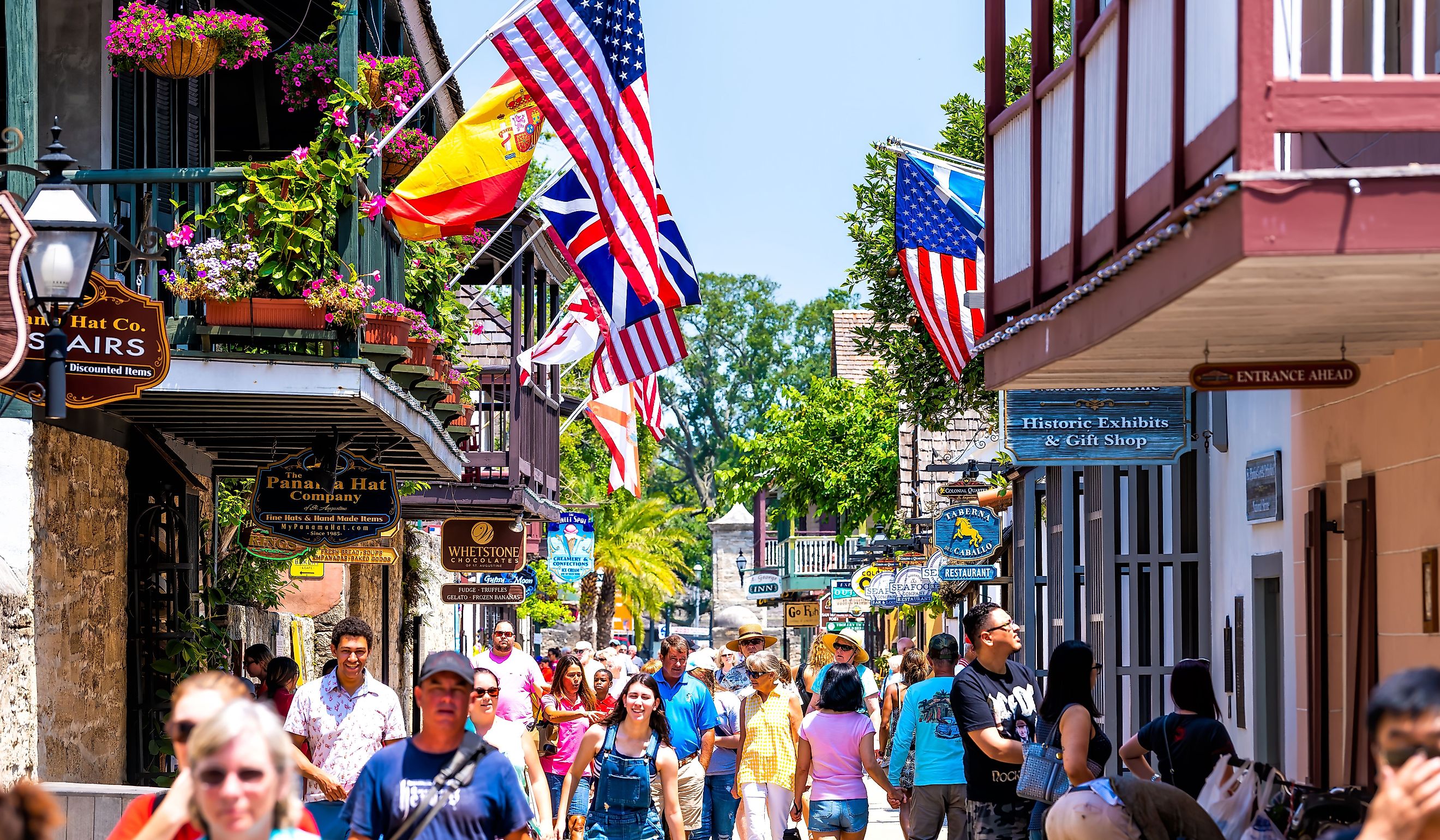 People shopping at Florida city St George Street by stores shops and restaurants in St. Augustine. 