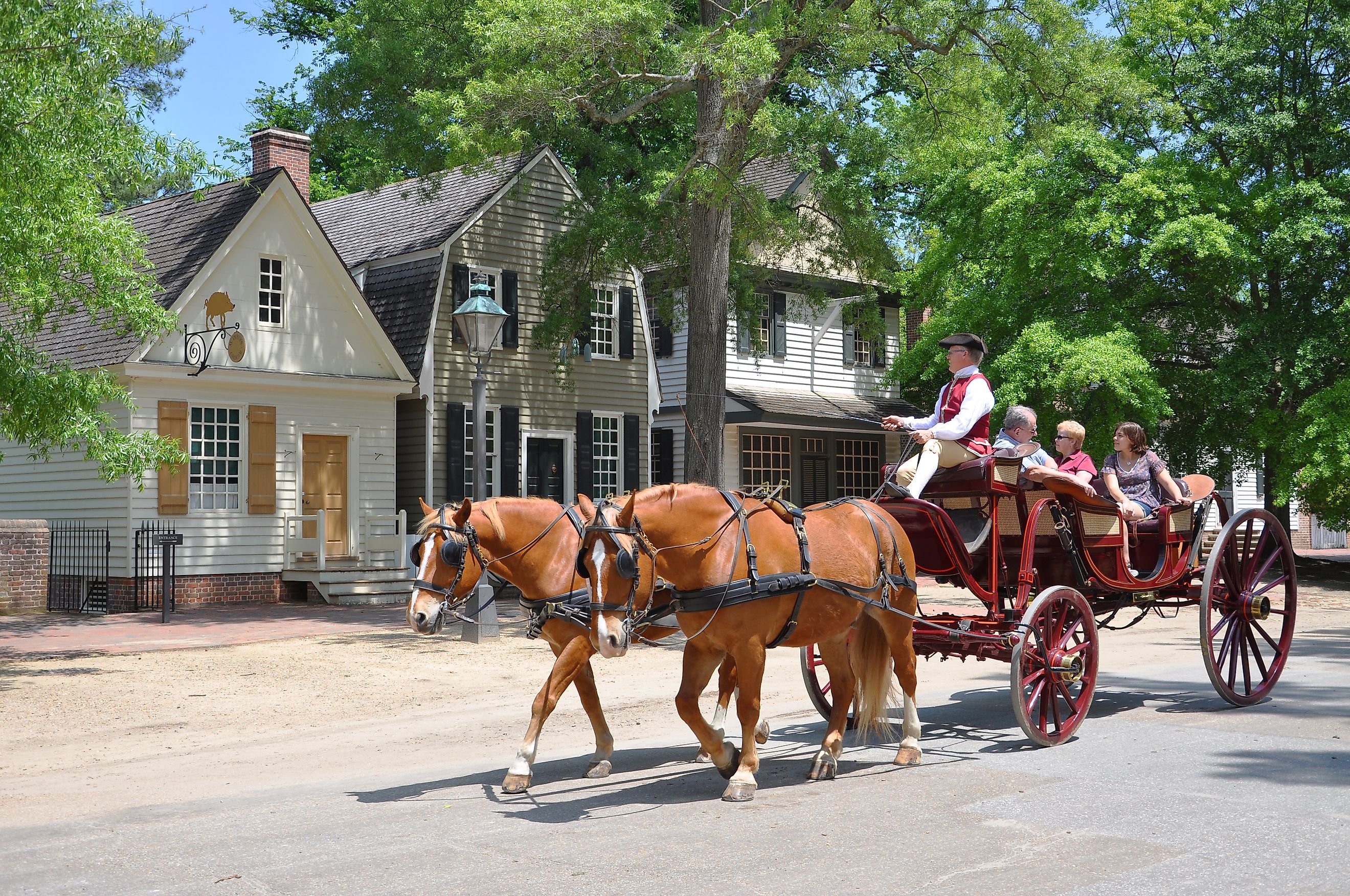 A horse drawn carriage tour of the historic district in Williamsburg, Virginia. Editorial credit: Wangkun Jia / Shutterstock.com