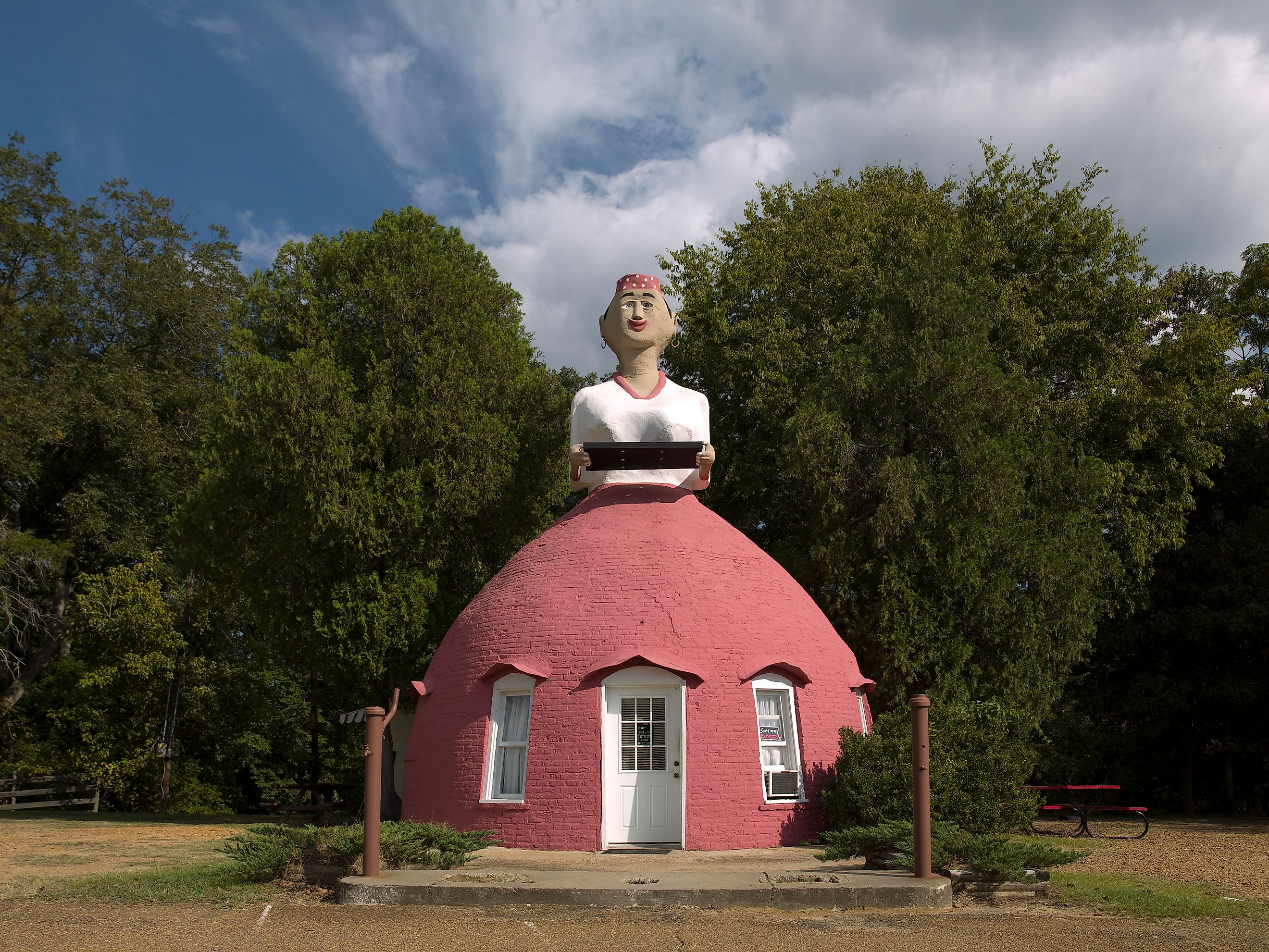 Mammy's Cupboard restaurant, a unique roadside eatery with a large, skirt-shaped structure, located along Highway 62 in Adams County, Mississippi