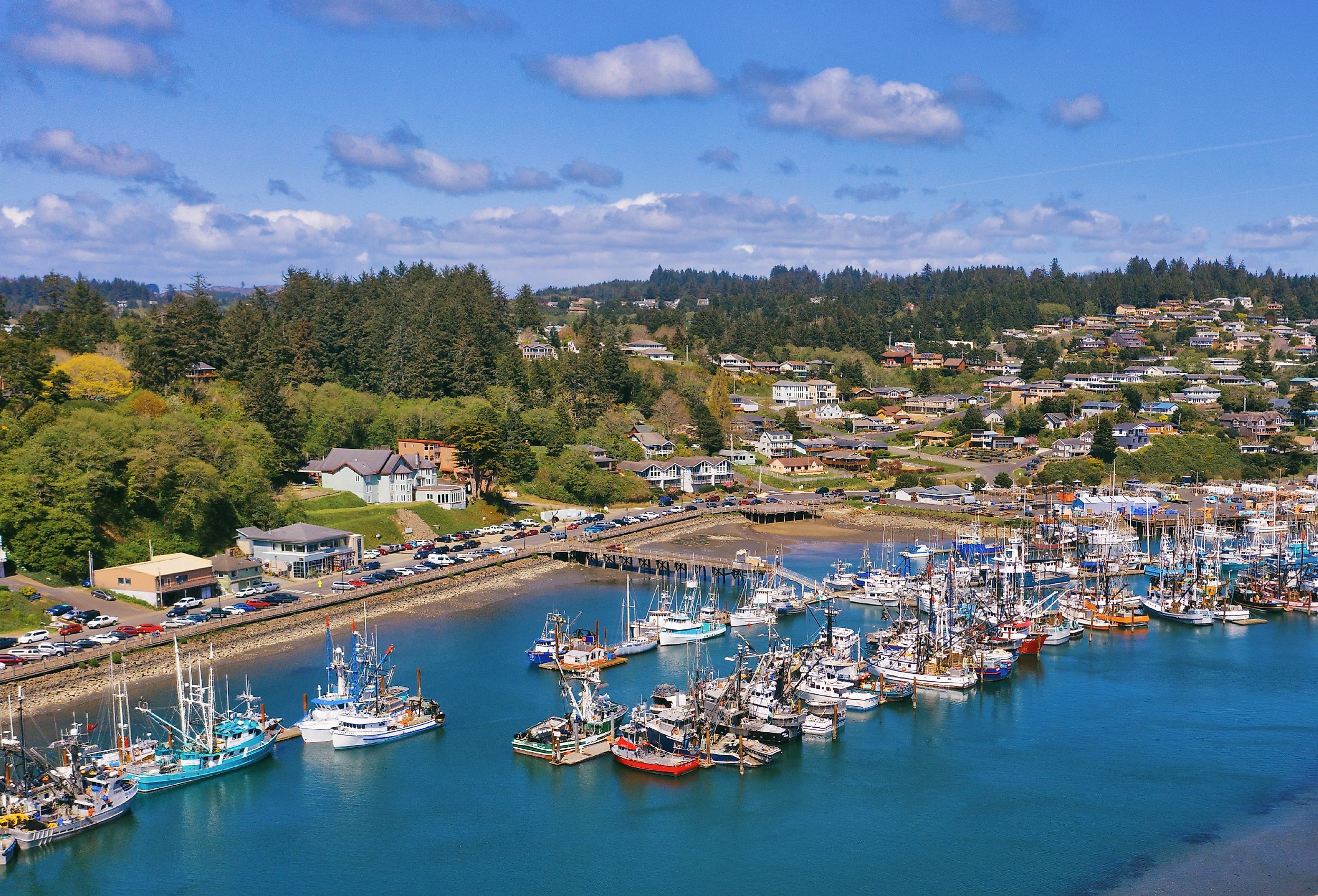 Aerial view of fishing fleet in Yaquina bay harbor marina in Newport, Oregon.