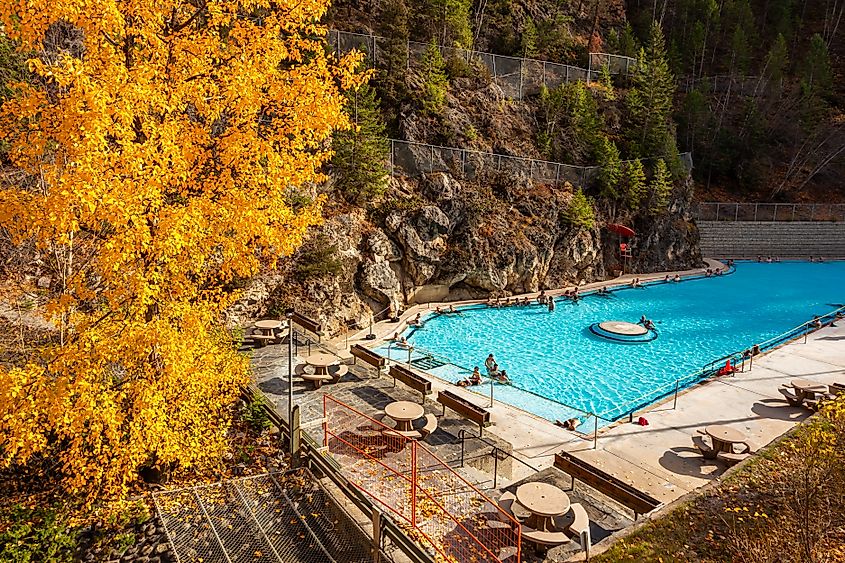 People enjoying the hot springs in the outdoor pool at Radium Hot Springs, BC, Canada